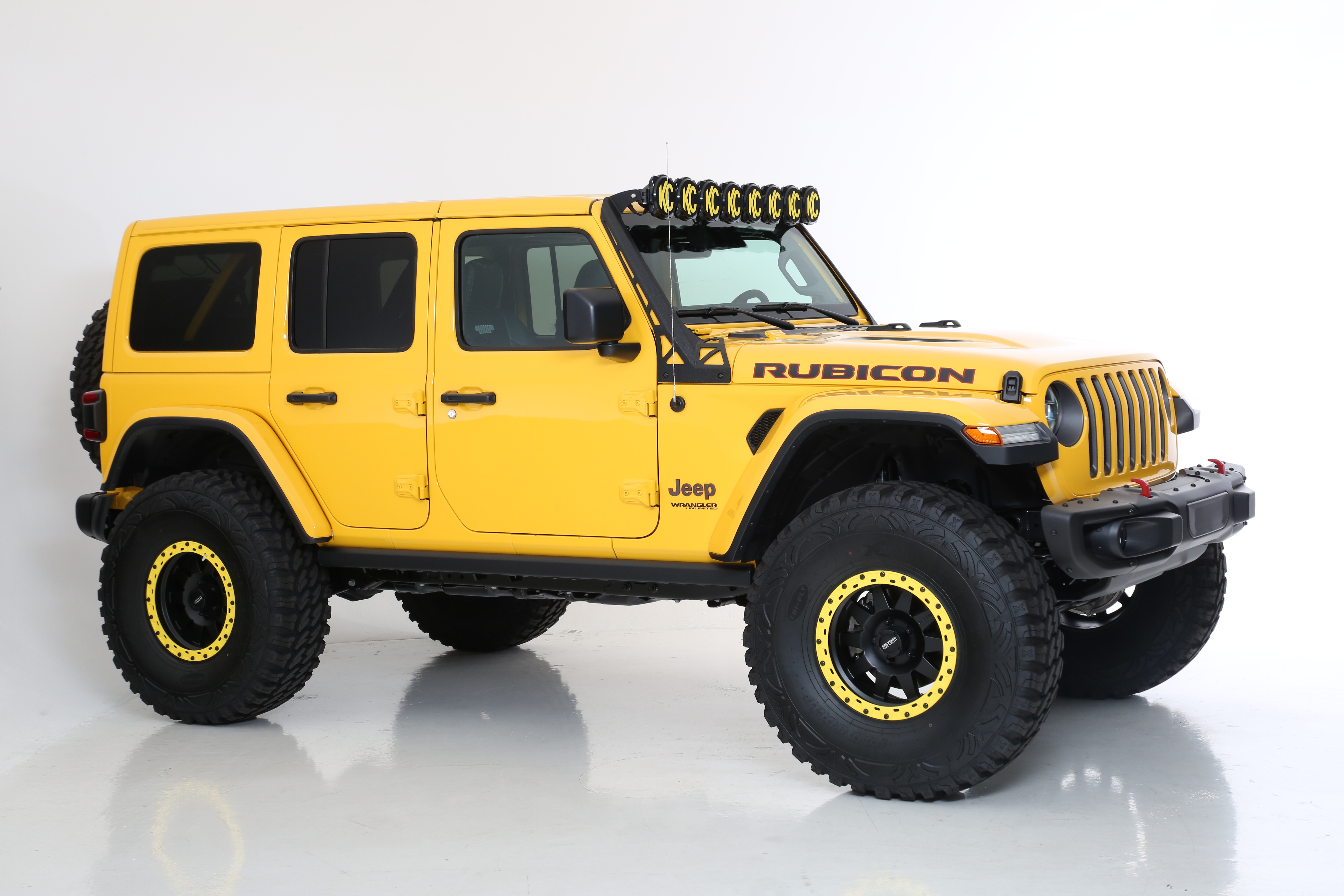 lifted JK Wrangler 2014 Dune color with Atlas bumpers from DSI